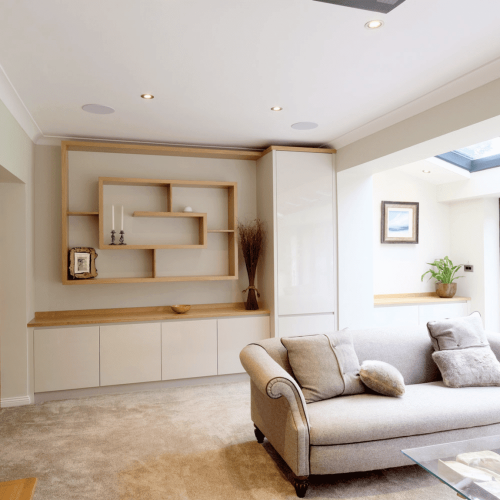 Riverdale bespoke fitted interiors lounge storage and shelving in light oak and cream finish